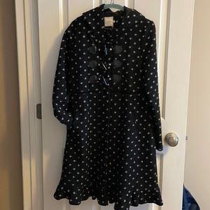 Black polka dot wool coat w cute buttons at chest and ruffle at hem.Cream sz 38